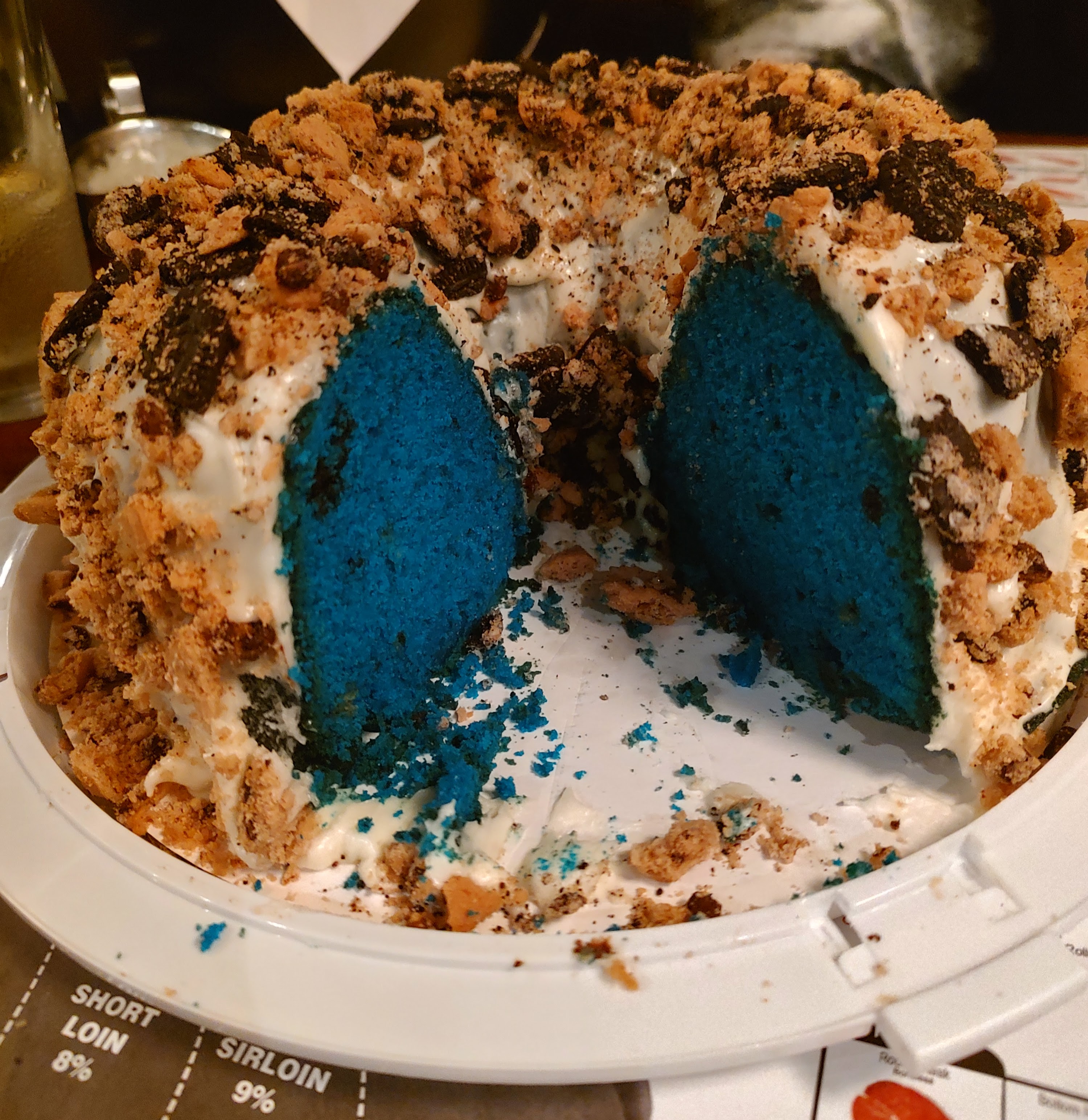 Blue velvet cookie crumble cake sliced open
